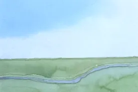 Groen gras, rivier, blauwe lucht