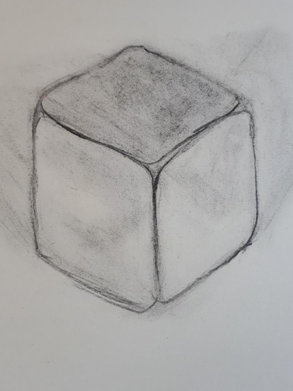 Een kubus in houtskool geschetst